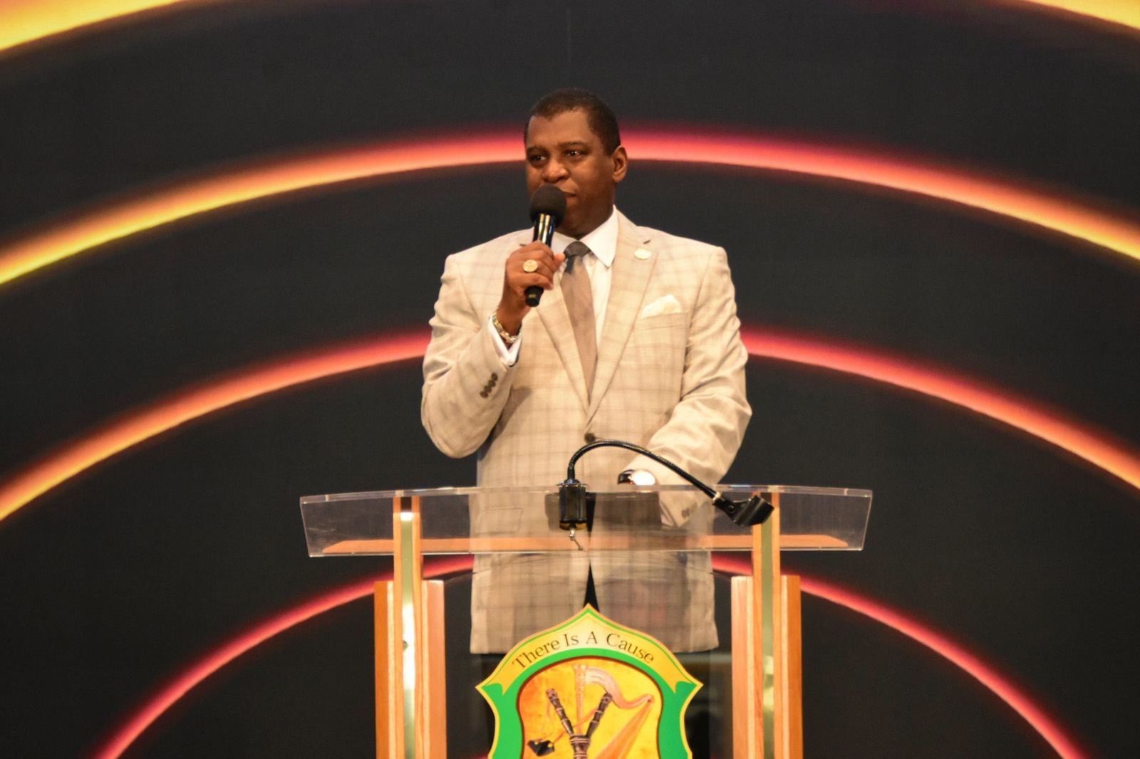 Bishop H. Curtis Douglas speaking from the podium.