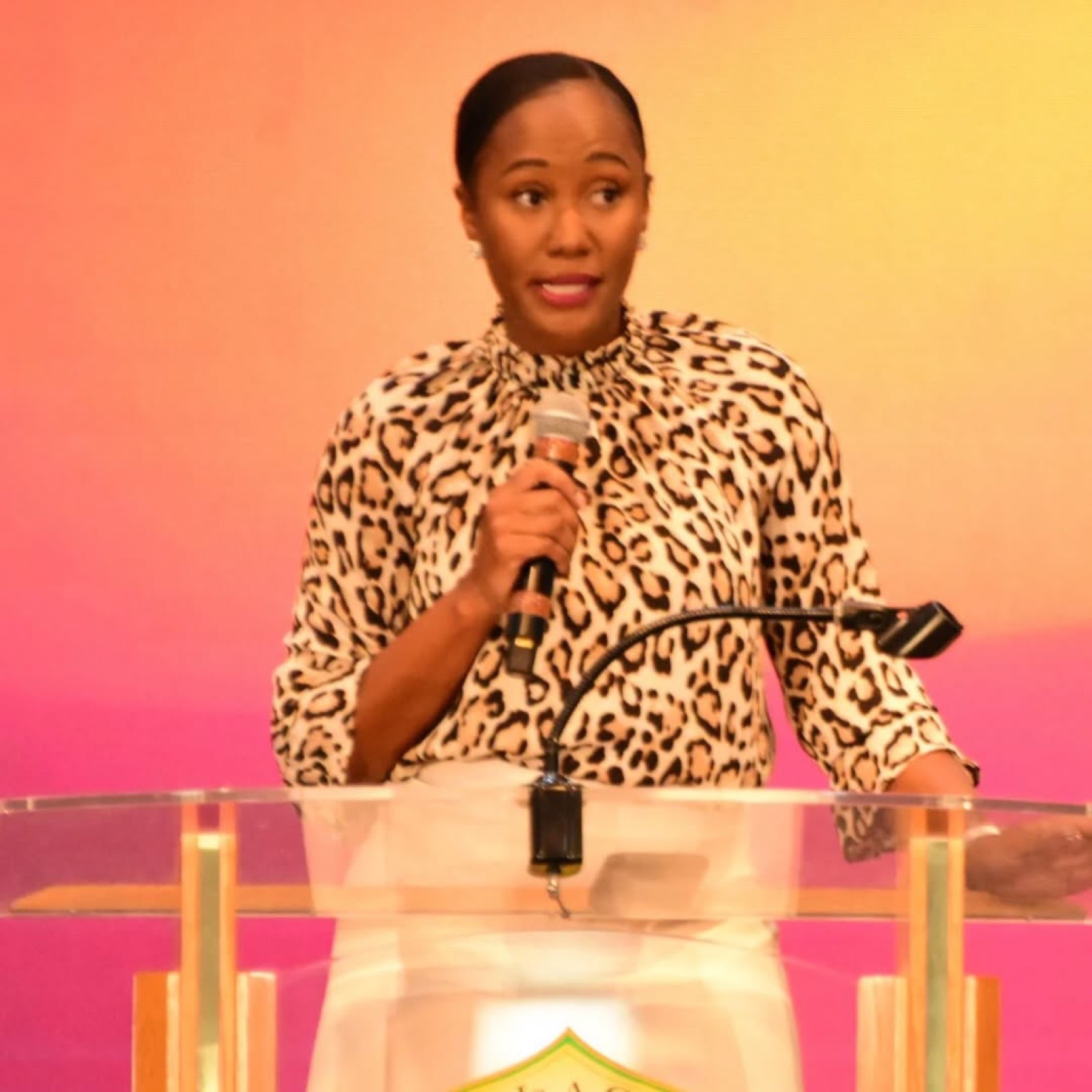 A speaker addresses the congregation from the pulpit.